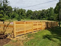 <b>4 foot high Cedar Horizontal Fence with alternating sized boards and dog ear posts</b>